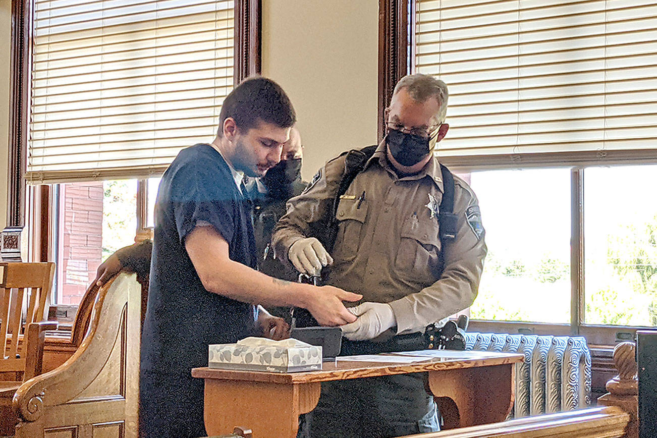 Robert John Cuevas, left, was sentenced to four years in prison on Friday after kidnapping and assaulting another Port Townsend resident last fall. (Zach Jablonski/Peninsula Daily News)
