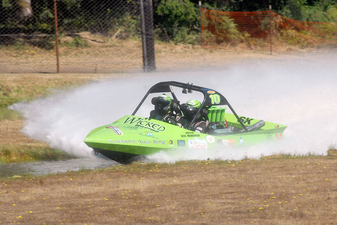 The Wicked Racing team of driver Dan Morrison and navigator Sara Hopf make a qualifying run on Saturday at the Extreme Sports Park in Port Angeles. (Keith Thorpe/Peninsula Daily News)