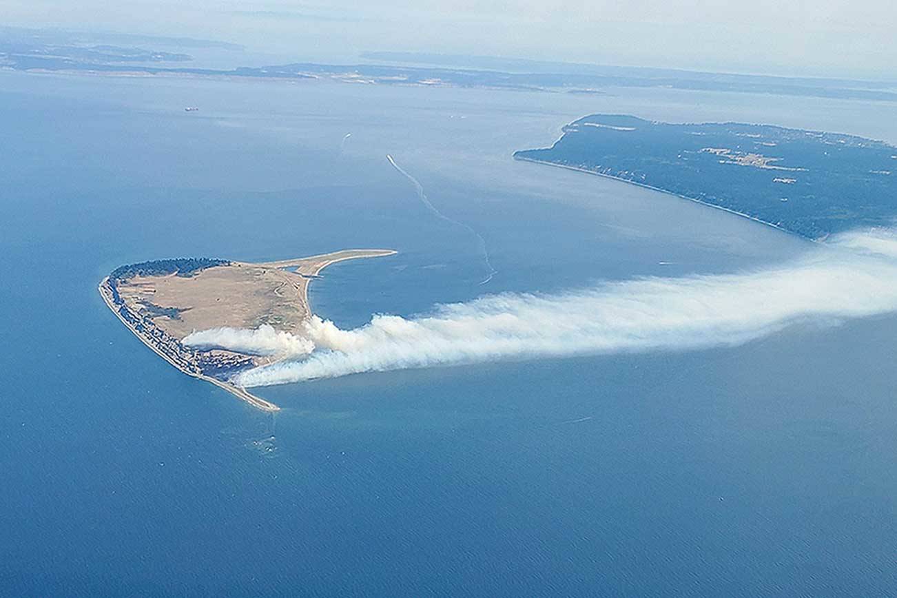 A fire on Protection Island is spotted from an aircraft on Tuesday. The state Department of Natural Resources was responding to the incident. (Photo courtesy of Jack Graham)