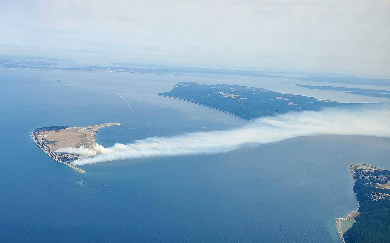 A fire on Protection Island is spotted from an aircraft on Tuesday. The state Department of Natural Resources was responding to the incident. (Photo courtesy of Jack Graham)