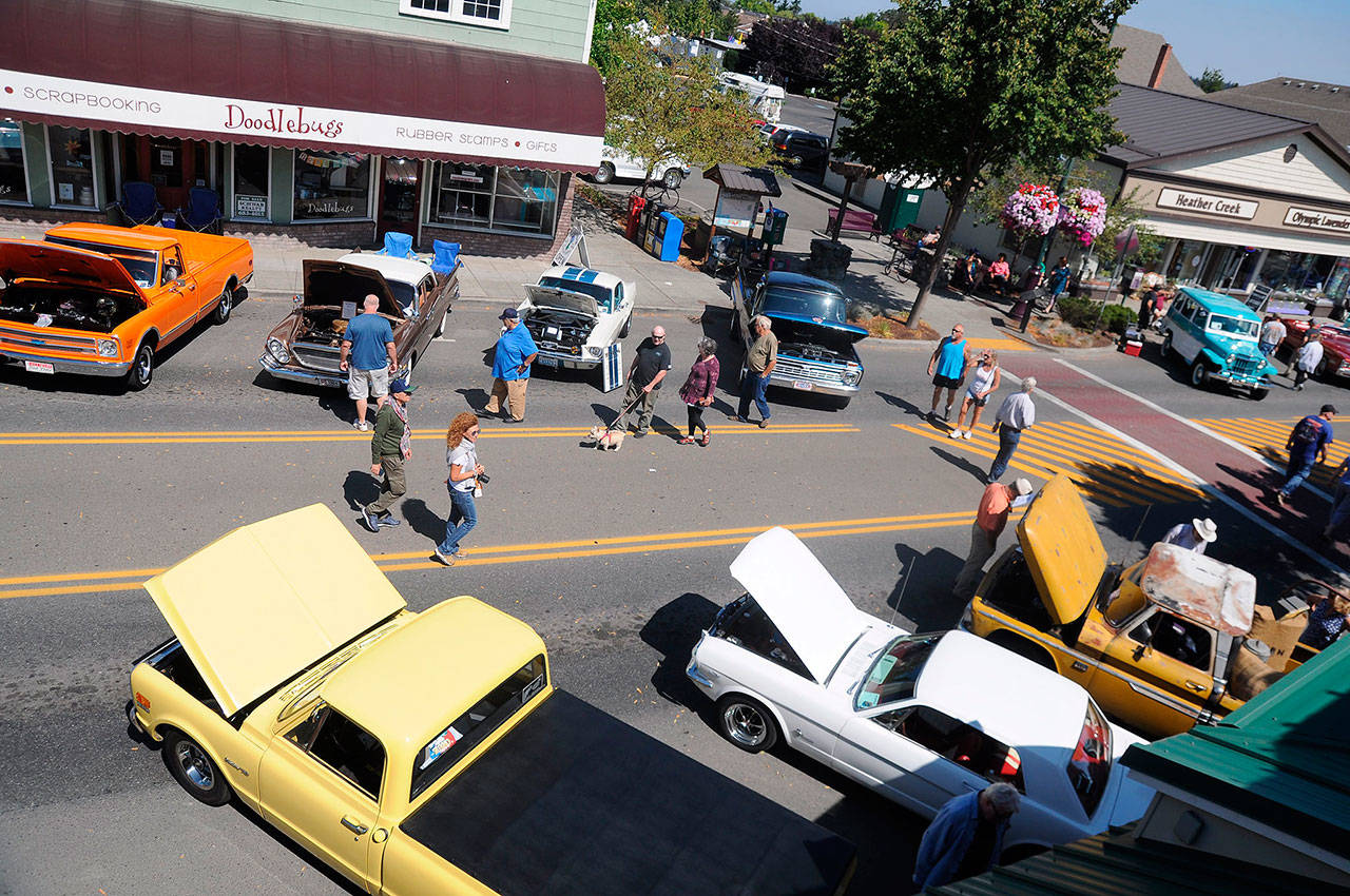 Check out a slew of classic cars, raffles and fun are set for the fourth-annual Sequim Prairie Nights, slated for Saturday, Aug. 7, in downtown Sequim. Sequim Gazette file photo by Michael Dashiell