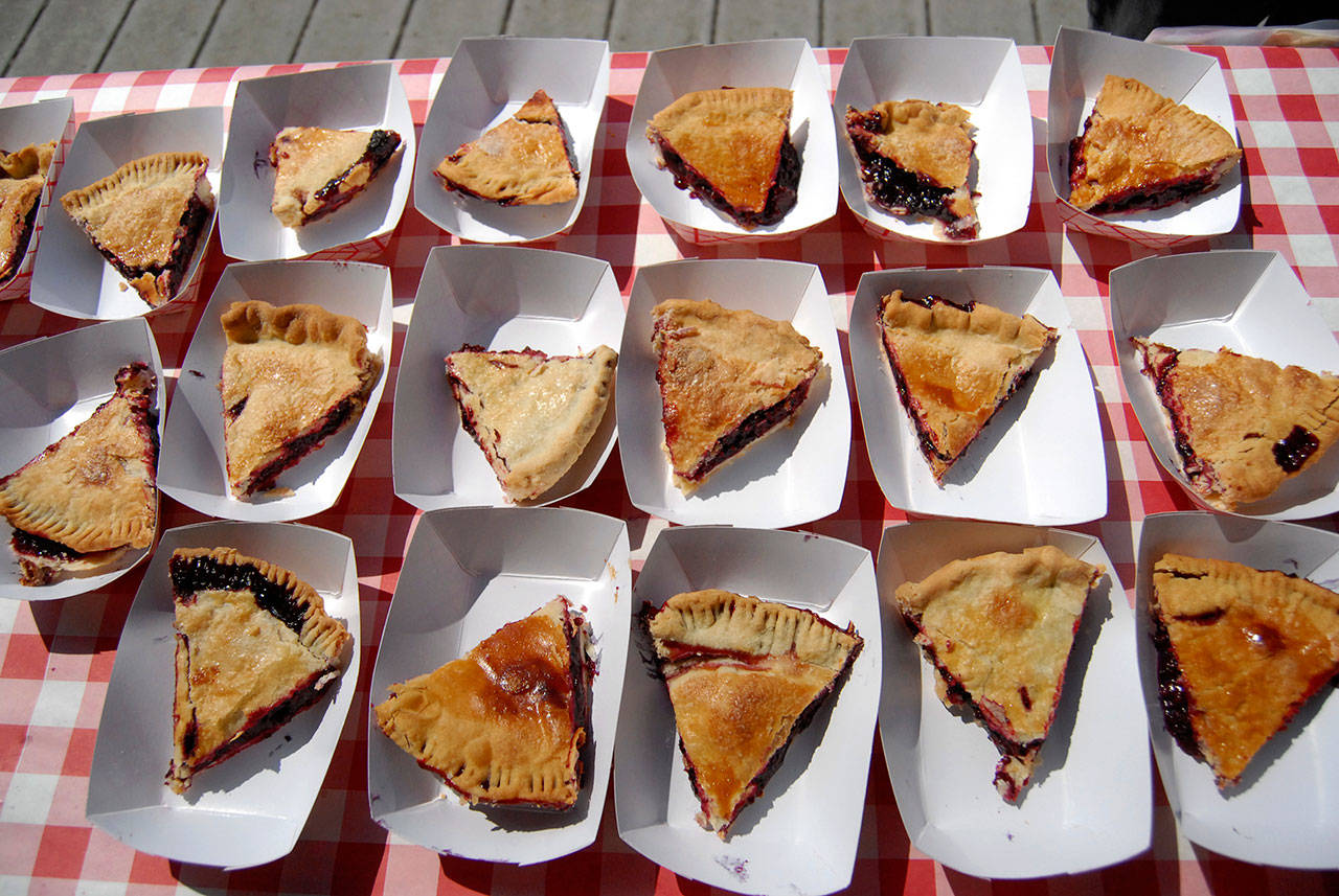 Slices of pie await purchase by Joyce Daze Wild Blackberry Festival visitors during the 2019 event. (Keith Thorpe/Peninsula Daily News)