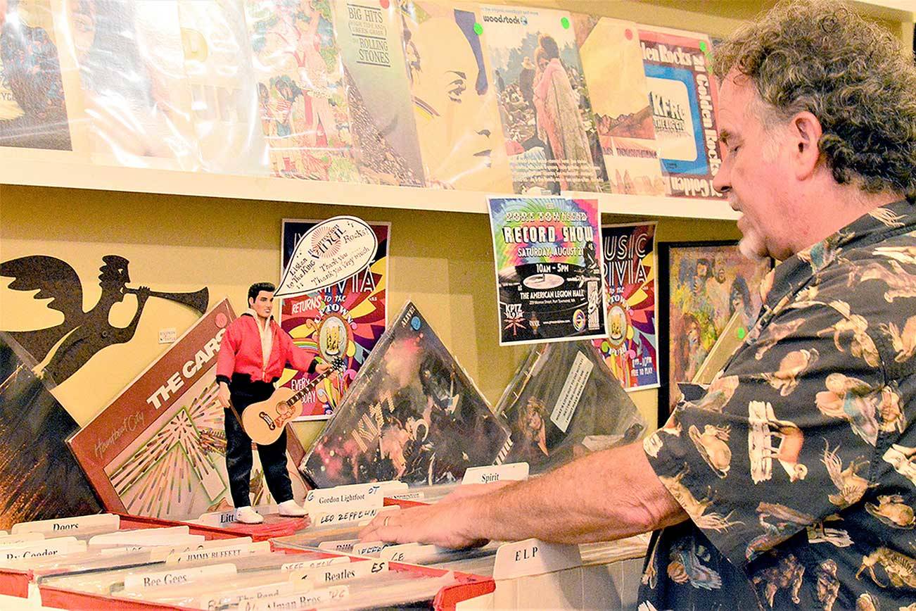 Port Townsend Record Show organizer Chuck Moses, who works at Magpie Alley downtown, is preparing for the show Saturday at the American Legion Hall. (Diane Urbani de la Paz/Peninsula Daily News)