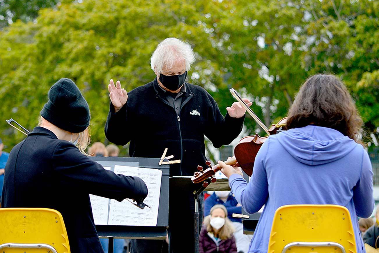 Retired Port Angeles High School orchestra director Ron Jones leads a chamber ensemble during Friday’s YEA Music! Camp finale concert at Fort Worden State Park. (Diane Urbani de la Paz/Peninsula Daily News)