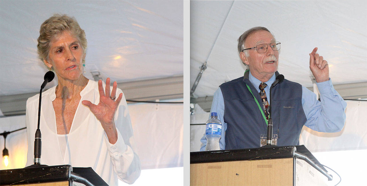 Dave Logan/for Peninsula Daily News Cherie Simkins, left, and Bob Sheedy, right, both 2020 inductees, speak at the Port Angeles Roughrider Hall of Fame dinner held at Civic Field on Saturday night.