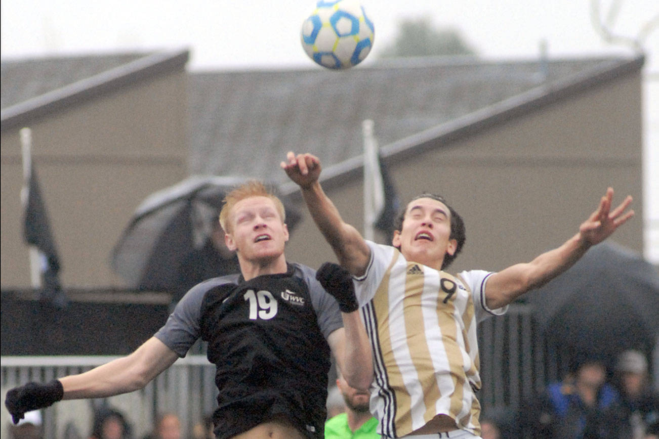 Wenatchee Valley's Erik Owen, left, and Peninsula's Nicolas Hernandez fight for a header during a 2019 NWAC Quarterfinal match. Hernandez, a Super Sophomore, returns for his third season with the Pirates this fall. (Keith Thorpe/Peninsula Daily News)
