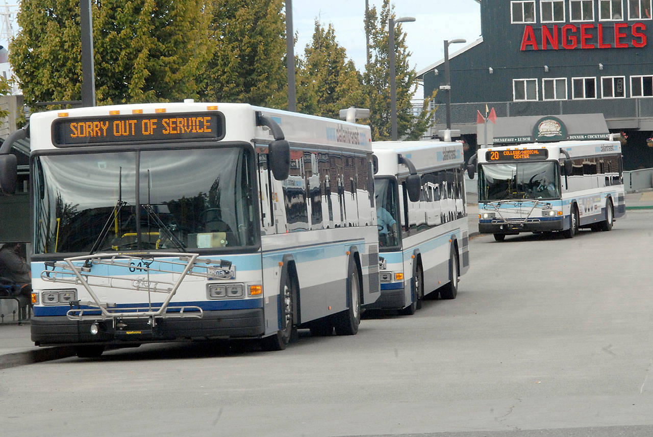 Clallam Transit buses line up at the The Gateway Transit Center in downtown Port Angeles on Friday. (Keith Thorpe/Peninsula Daily News)