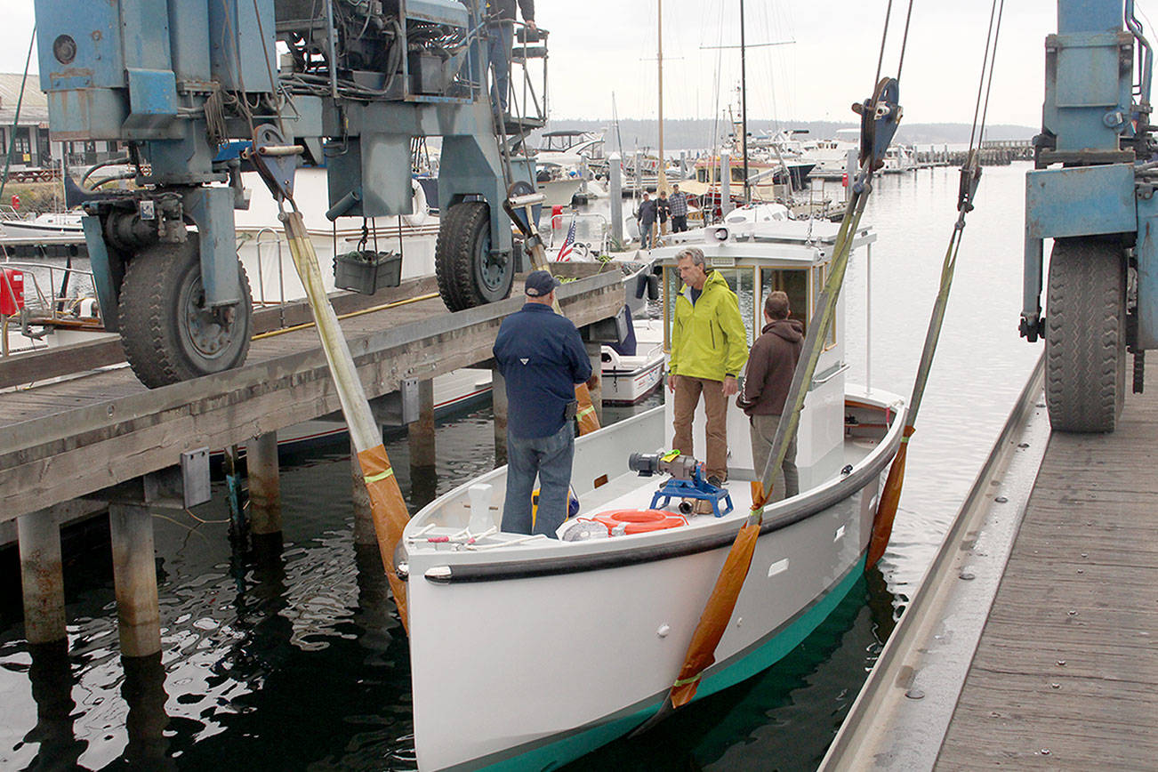The Clean Bay is an all electric, zero-emission work boat built by students of the School, that will be based out of Port Ludlow Bay, to provide free pump out services to recreational mariners. (Zach Jablonski/Peninsula Daily News)