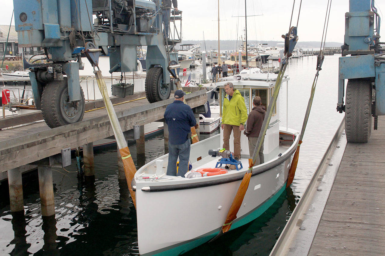 The Clean Bay is an all electric, zero-emission work boat built by students of the School, that will be based out of Port Ludlow Bay, to provide free pump out services to recreational mariners. (Zach Jablonski/Peninsula Daily News)