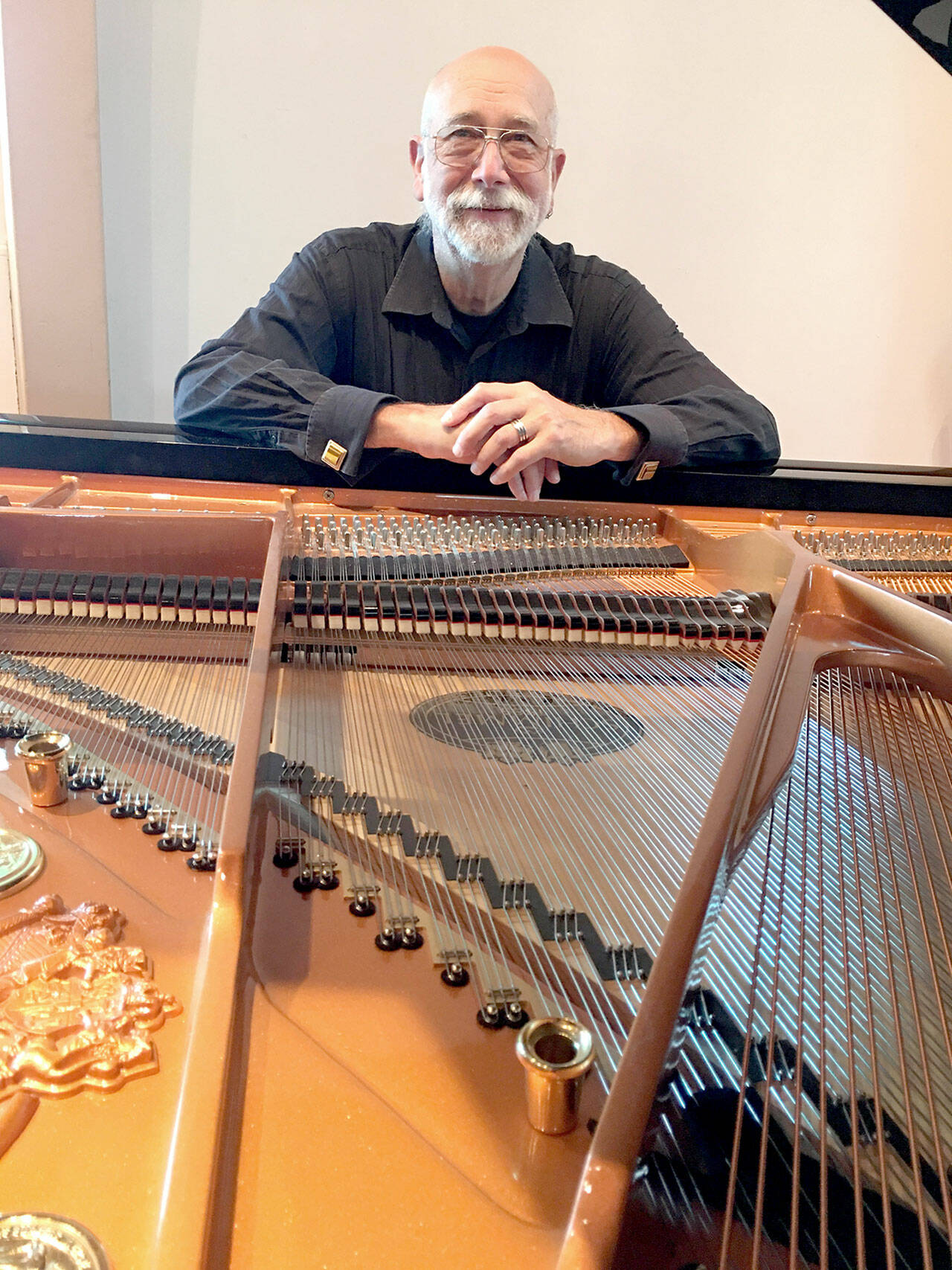 Pianist Mike Carroll of Port Ludlow will give an online Candlelight Concert Thursday night to benefit Gatheringplace of Port Townsend. (Photo courtesy of Mike Carroll)