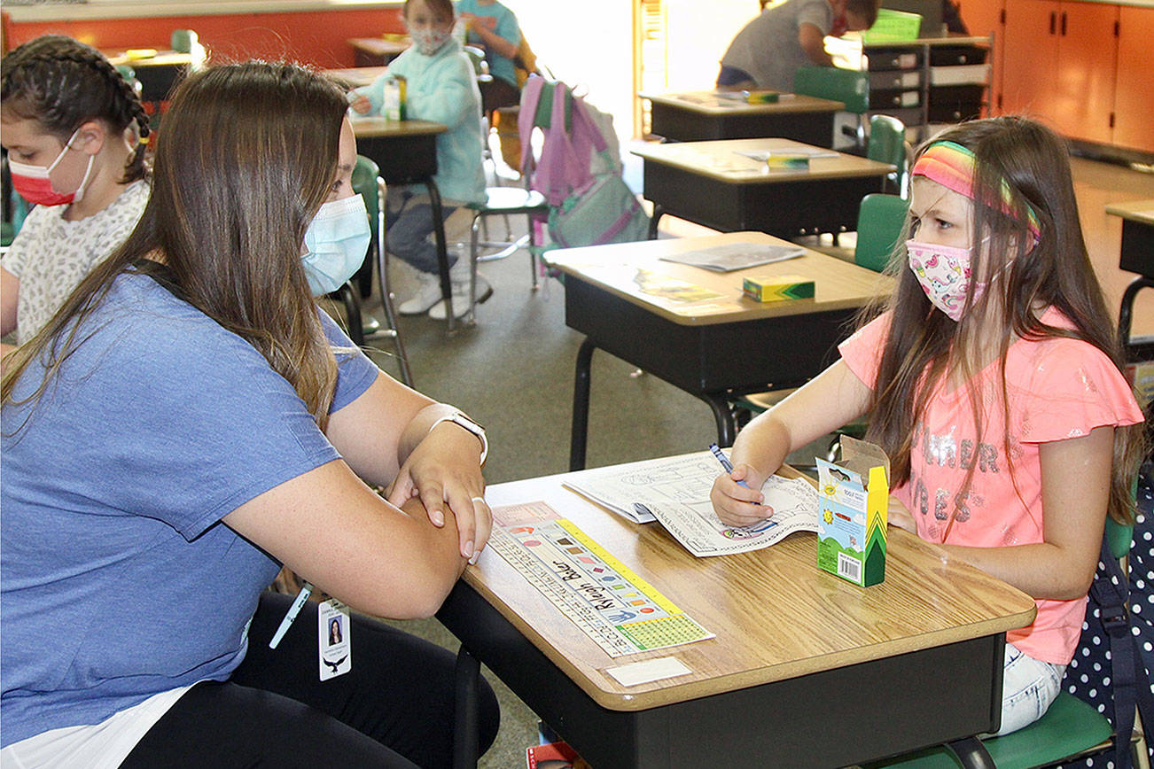 It was the first day of school for First graders in Mrs. Johnson classroom at Hamilton Elem in PA. Just over 20 students were greeted by the teacher and all wore masks and sat upwards of six feet apart.