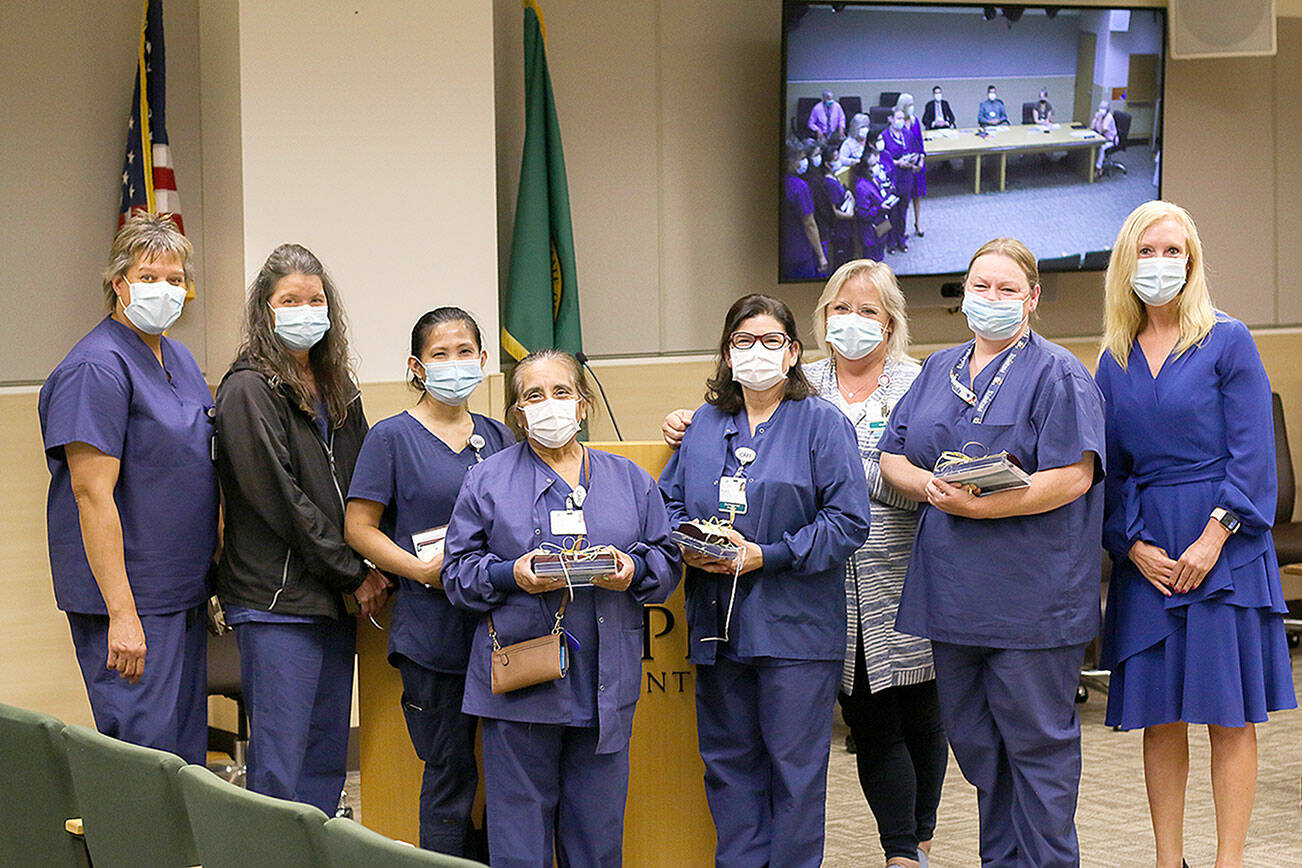 Olympic Medical Center recently honored its laundry room staff. From left are Kathy Richison, Sena Bradow, Minda Dugan, Evelia Jacoba-Sanchez, Blanca DeLeon, Director of Support Services Julie Black, Sonye Woolsey and Human Resource Officer Jennifer Burkhardt.