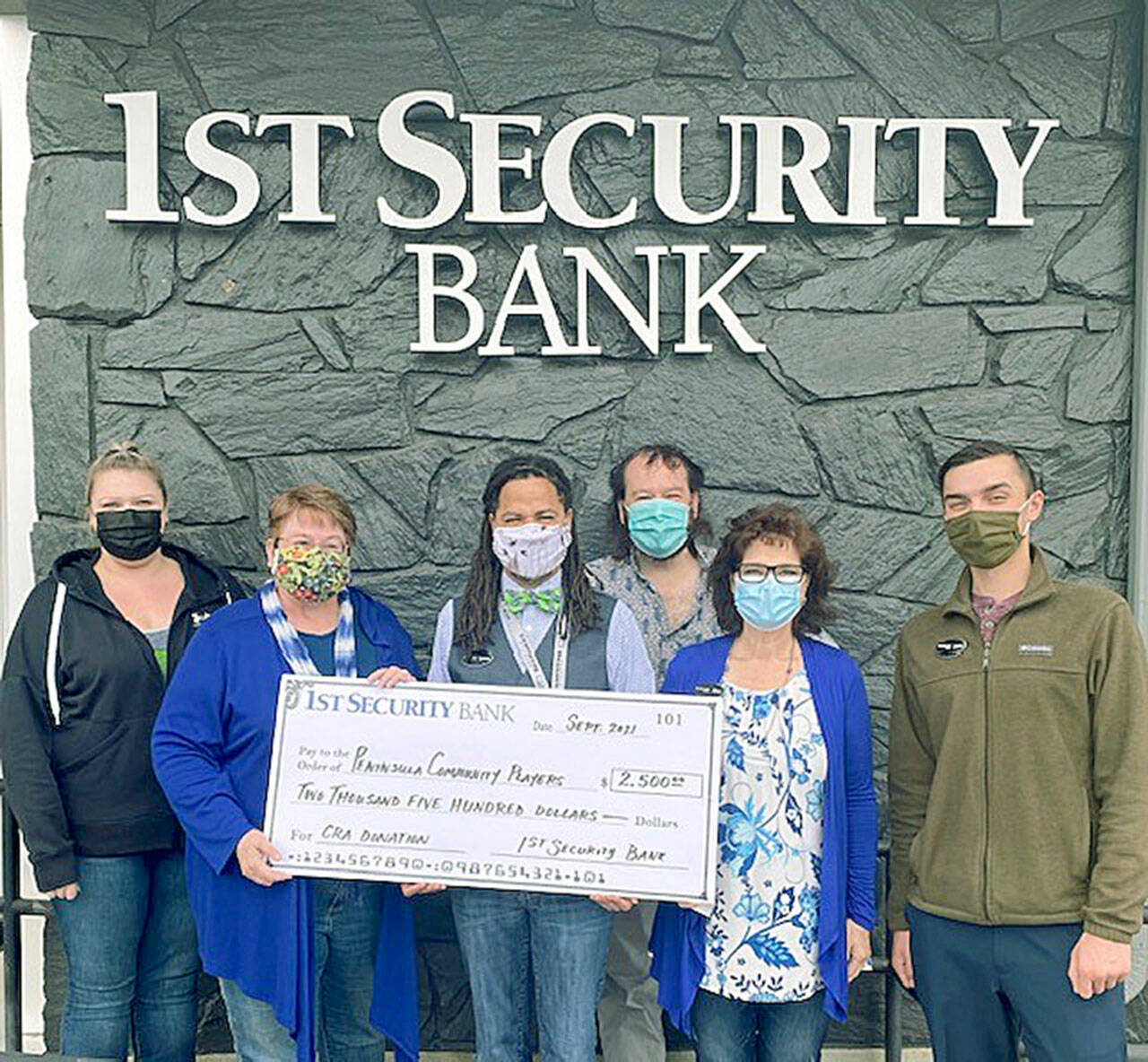 The Port Angeles Branch of 1st Security Bank has donated $2,500 to the Port Angeles Community Players to upgrade the ventilation system in the playhouse. The improved system will make it safer for audiences at the players’ performances. Pictured, from left to right, are Stephanie McFadden, Barbara Frederick, Tyrone Beatty, Richard Stephens, Elisa Simonsen and John James.