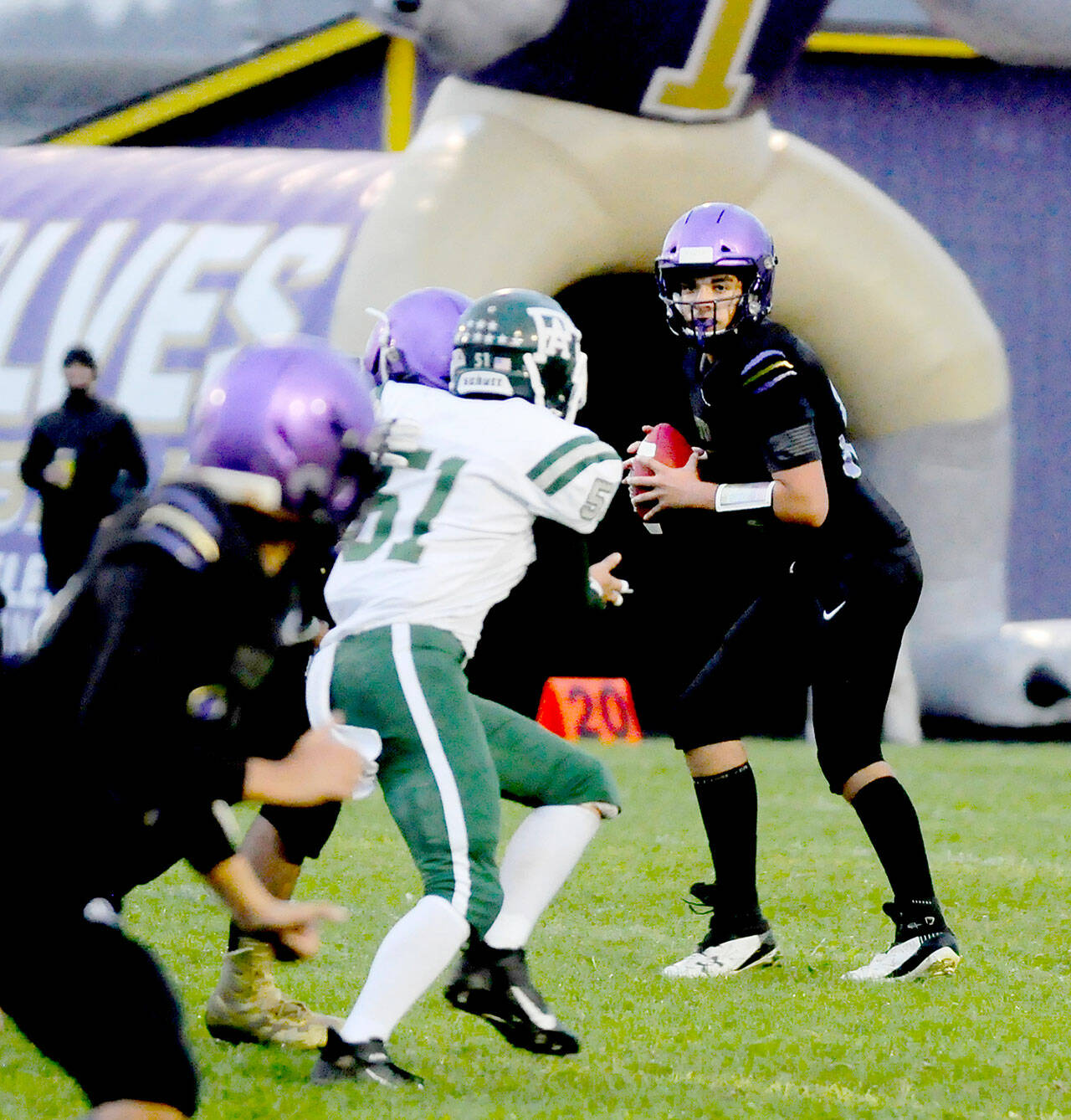 Sequim sophomore Lars Wiker made his first varsity start at quarterback during the Wolves’ 17-12 rivalry victory over Port Angeles. (Michael Dashiell/Olympic Peninsula News Group)