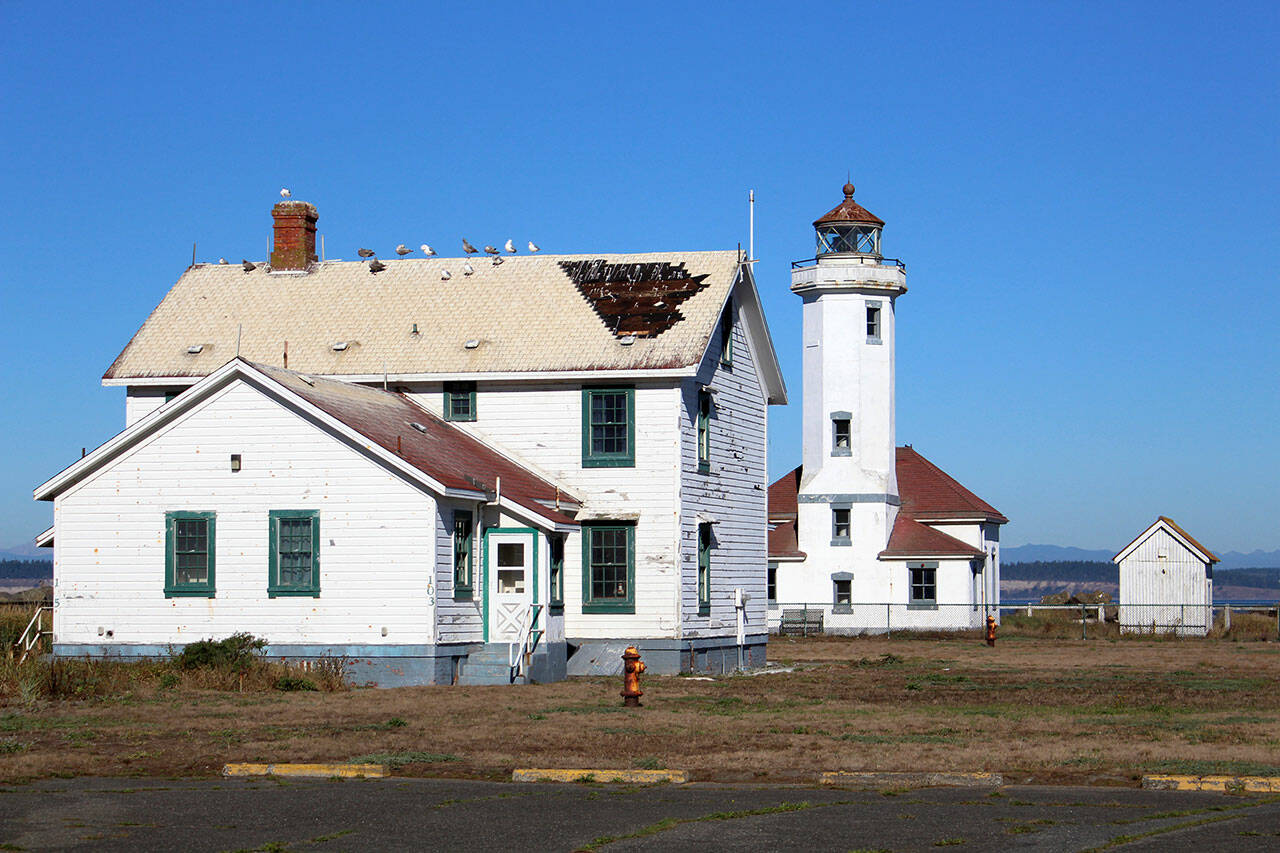 The U.S. Lighthouse Society is hosting a kickoff event at 3 p.m. Tuesday at the Point Wilson Lighthouse to highlight the next phase of renovations for the lighthouse and its two dwellings. (Zach Jablonski/Peninsula Daily News)