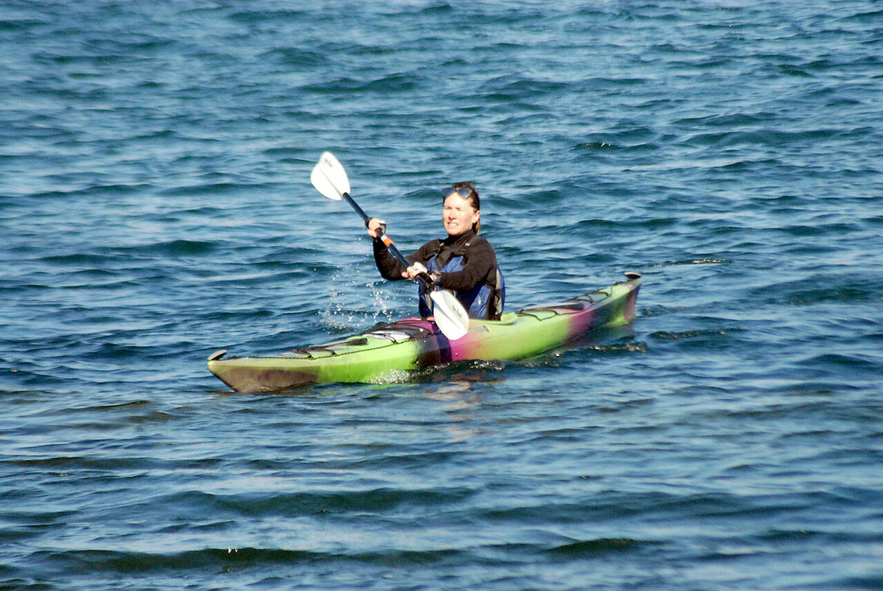 Heidi Hietpas of Sequim completes the kayaking leg of Saturday’s Big Hurt as part of a tandem team with her husband, Forest Hietpas. (Keith Thorpe/Peninsula Daily News)