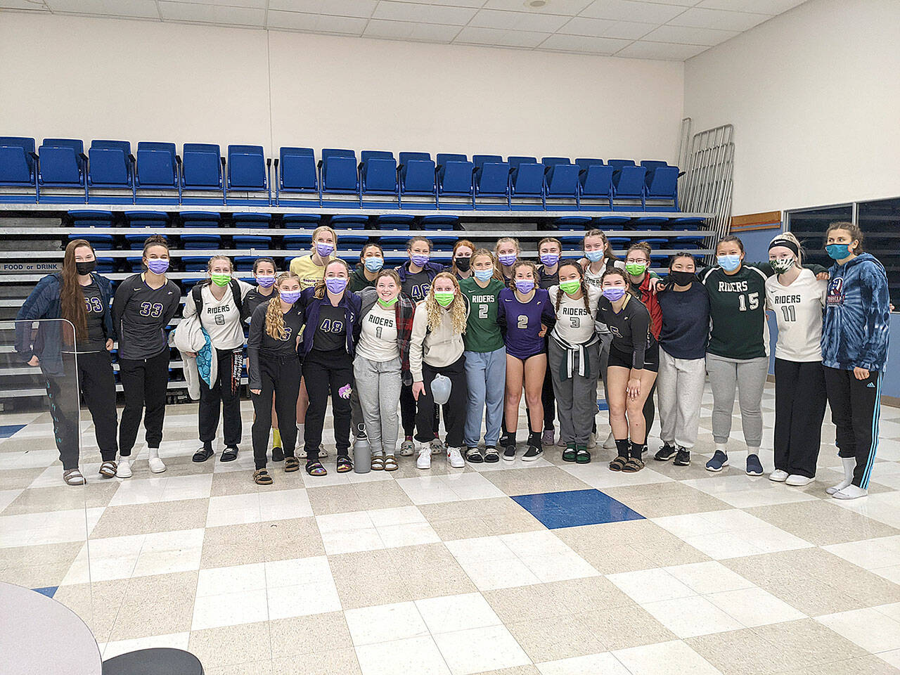 The Port Angeles and Sequim volleyball teams celebrate their showings at the Monarch Volleyball Tournament held in Longview this weekend.