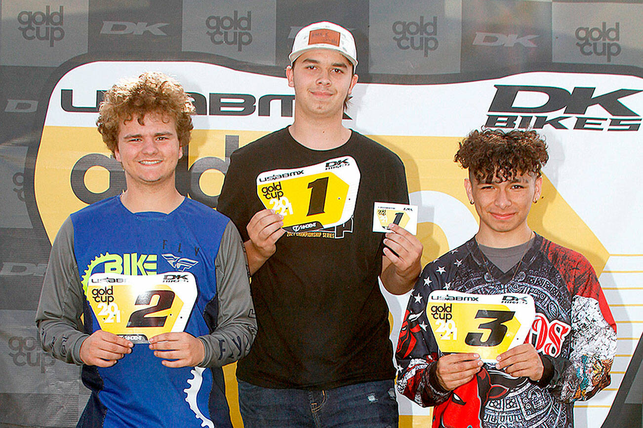 Chase Schweitzer of Port Hadlock, center, took the No. 1 plate at the Northwest Region BMX championships held in Richland Saturday and Sunday. At left is second-place finisher Kameron Johnson and at right is third-place finisher Erick Rios.