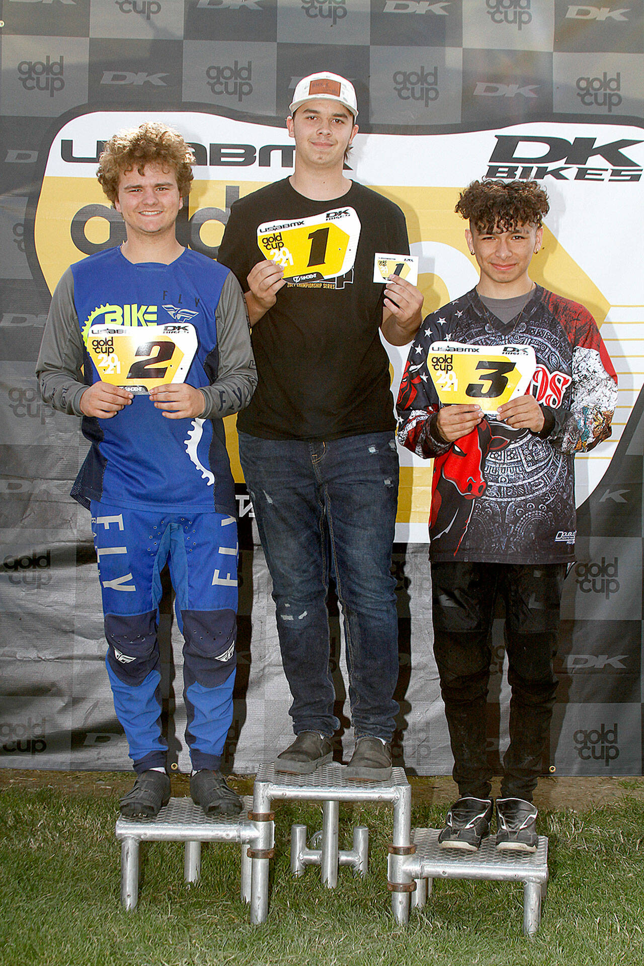 Chase Schweitzer of Port Hadlock, center, took the No. 1 plate at the Northwest Region BMX championships held in Richland Saturday and Sunday. At left is second-place finisher Kameron Johnson and at right is third-place finisher Erick Rios.