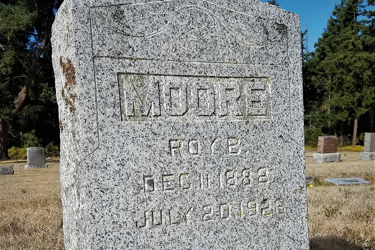 Gravestone of Roy B. Moore. (John McNutt/for Peninsula Daily News)