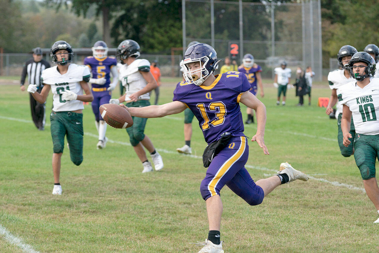 Steve Mullensky/for Peninsula Daily News Ranger Kevin Alejo extends the ball over the plane of the goal line for a touchdown during a Thursday afternoon game home game against the Muckleshoot Kings.