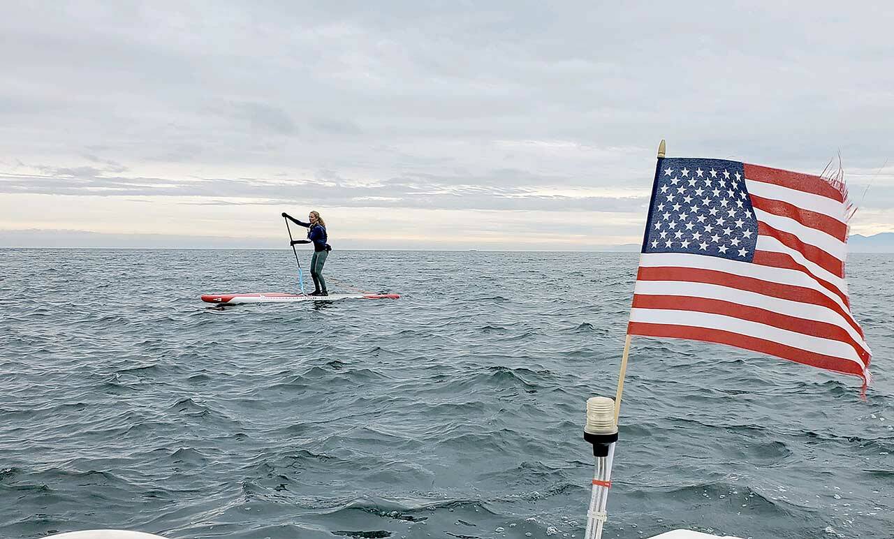 Hannah Nelson of Port Angeles crossed the Strait of Juan de Fuca on a paddleboard to raise money for domestic violence services. (Laura Hall)