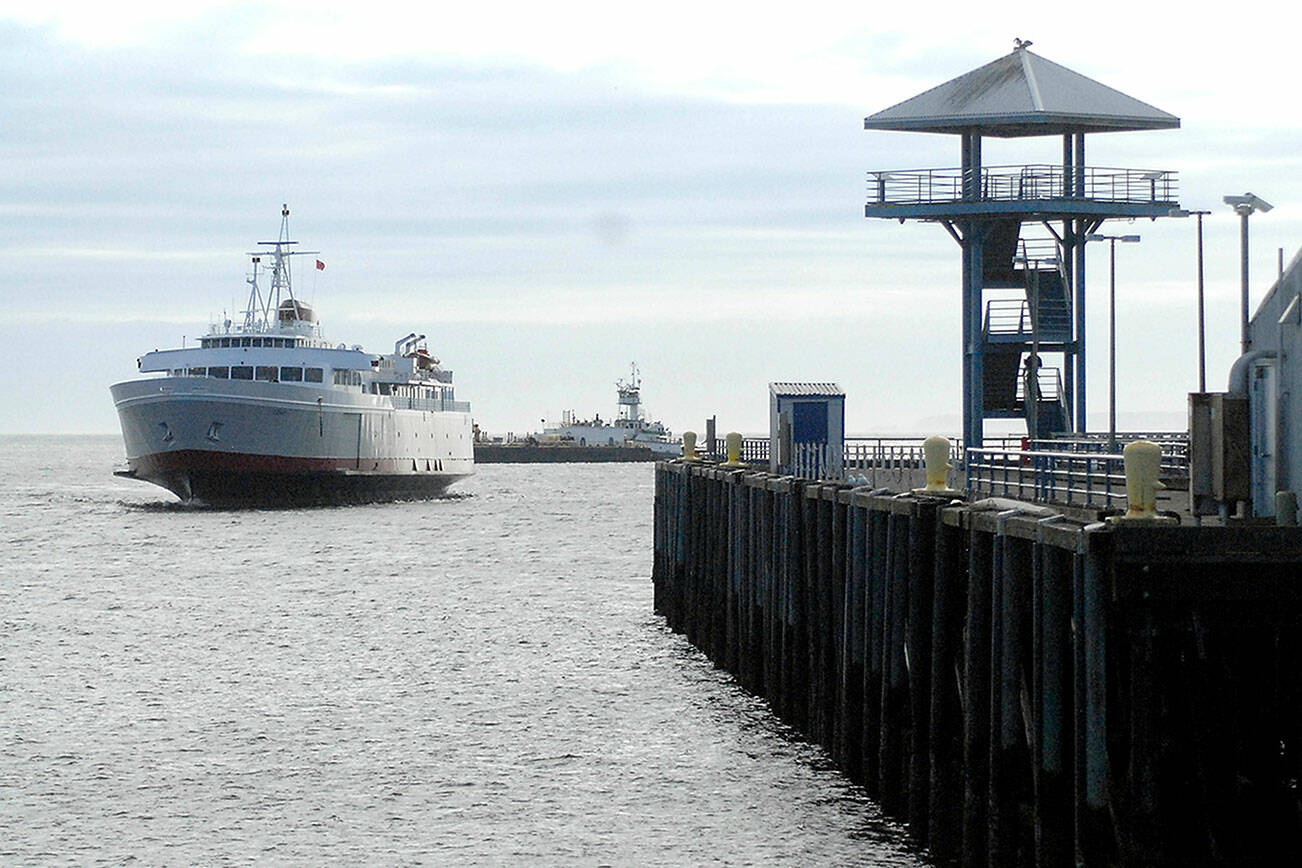 The ferry MV Coho sails past Port Angeles City Pier during a maintenance run in May 2020. (Keith Thorpe/Peninsula Daily News)