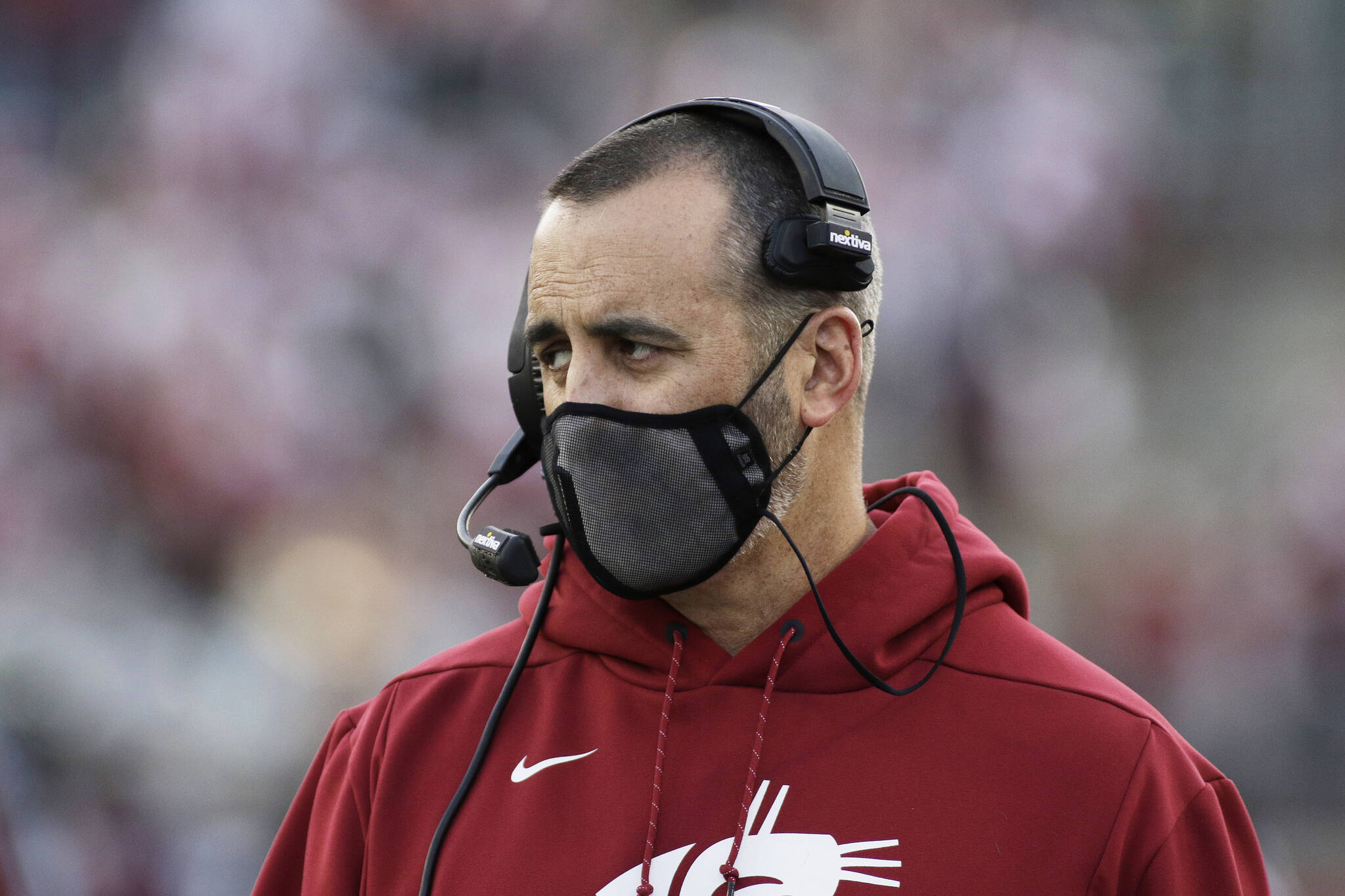 Washington State coach Nick Rolovich watches during the first half of the team's NCAA college football game against Stanford, Saturday, Oct. 16, 2021, in Pullman, Wash. (AP Photo/Young Kwak)