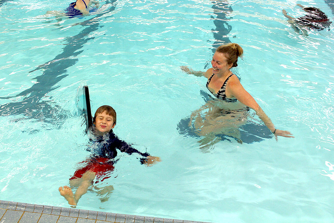Port Townsend residents Corbin Meyers, 5, and his mother Laura enjoy the Mountain View Pool in Port Townsend on Tuesday morning. The pool reopened to the public on Monday. (Zach Jablonski/Peninsula Daily News)
