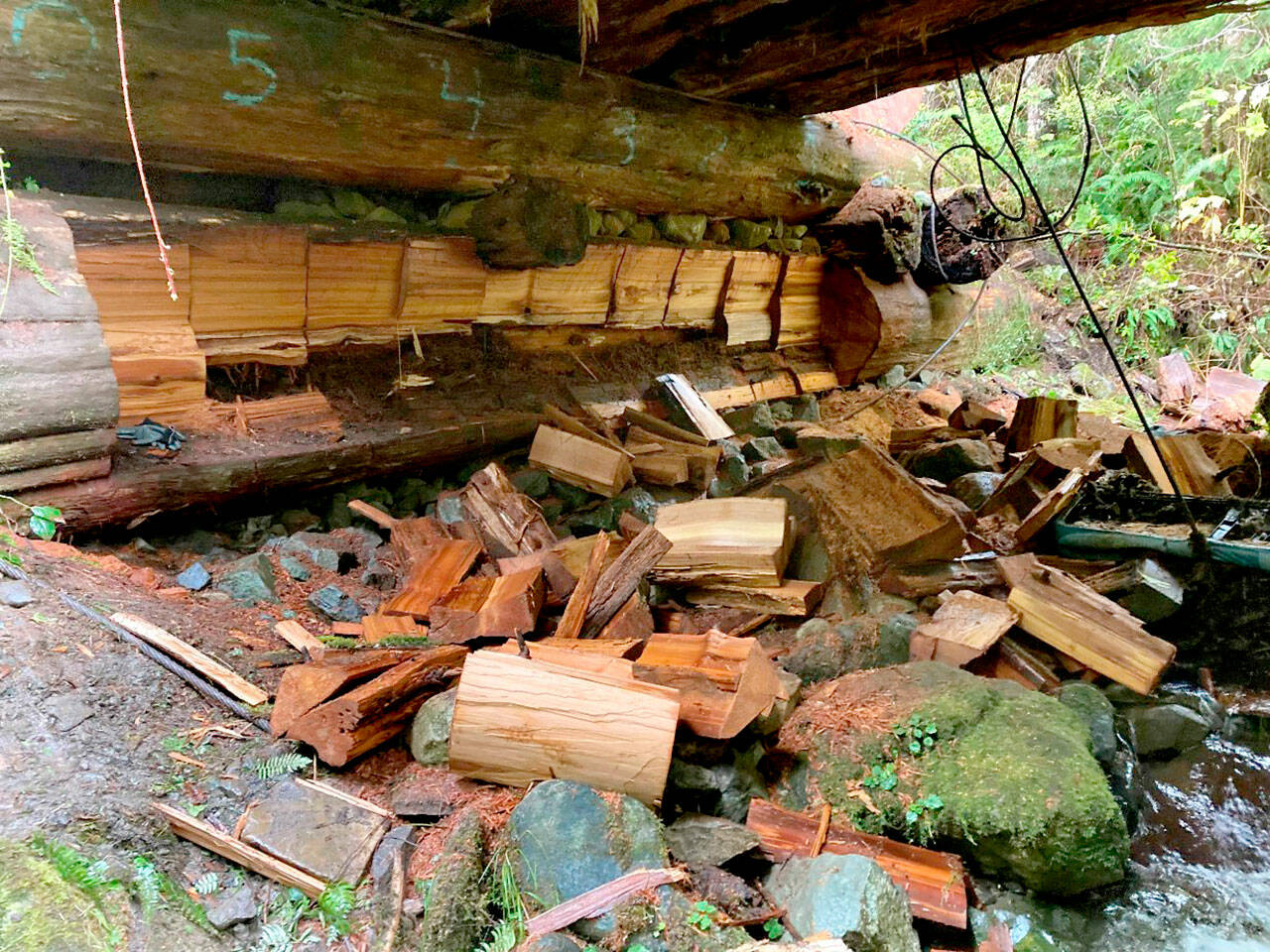 Two Forks men are accused of cutting chunks of cedar from a state Department of Natural Resources bridge at a DNR property on the Upper Hoh Road in West Jefferson County. (Photo courtesy of Department of Natural Resources)