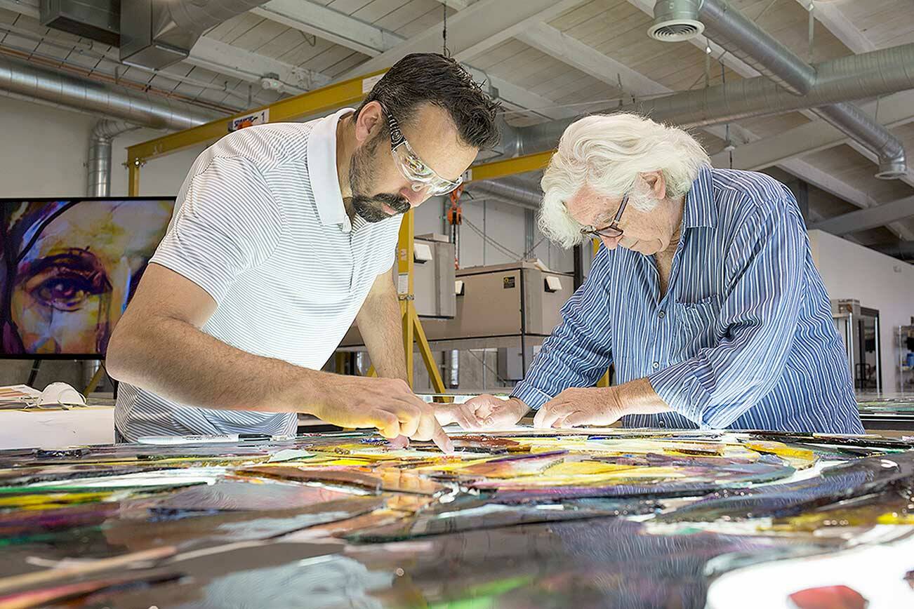Artists Tim Carey, left, and Narcissus Quagliata collaborate on the largest stained glass creation in the world in “Holy Frit,” the Port Townsend Film Festival Pic available for streaming this week. (Kyle J. Mickelson/Judson Studios)