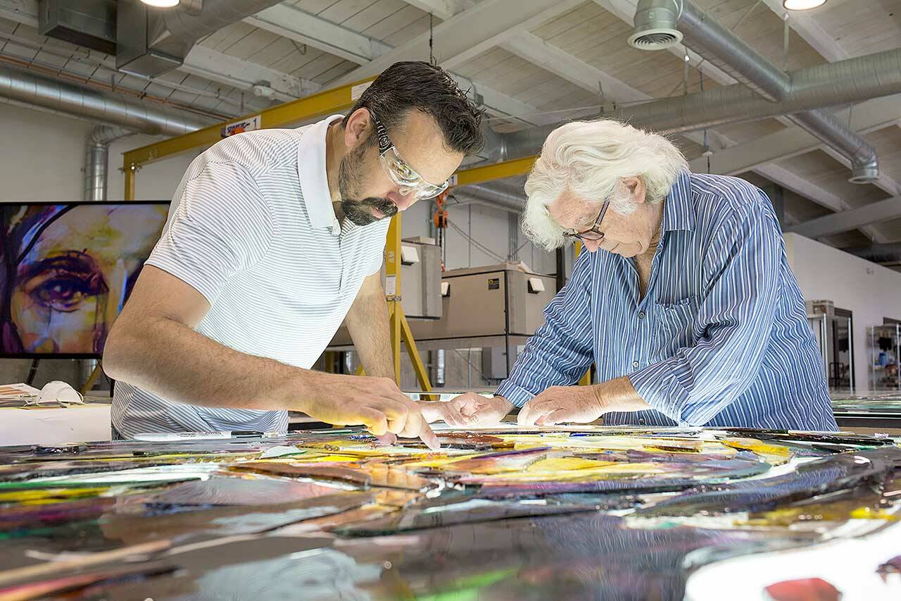 Artists Tim Carey, left, and Narcissus Quagliata collaborate on the largest stained glass creation in the world in “Holy Frit,” the Port Townsend Film Festival Pic available for streaming this week. (Kyle J. Mickelson/Judson Studios)