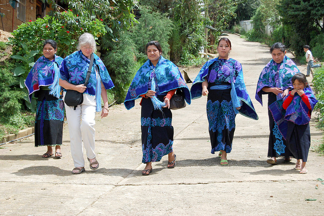 Judith Pasco, second from left, takes a walk with women in Zinacantán, Mexico, in July 2008, two years after cofounding the Mujeres de Maiz Opportunity Foundation. Diane Urbani de la Paz/Peninsula Daily News