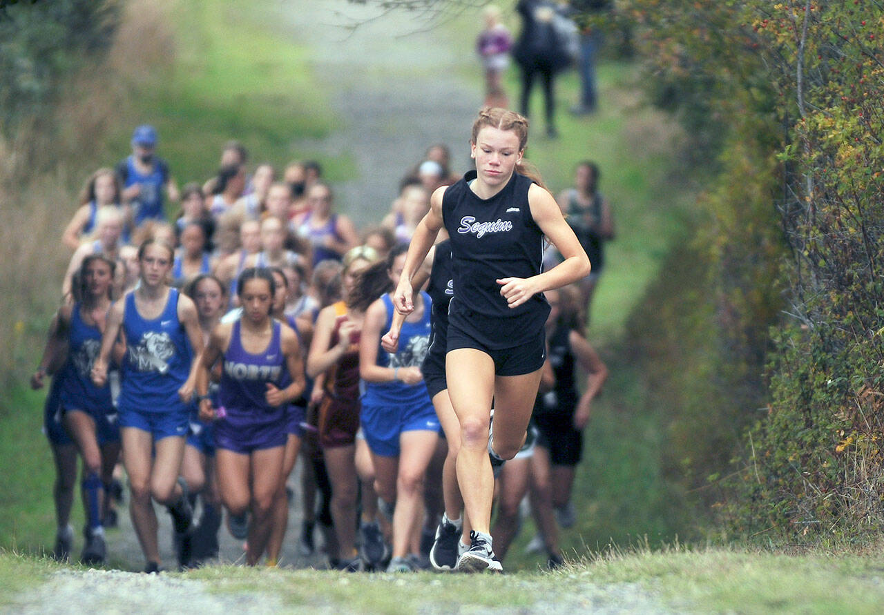 Sequim’s Riley Pyeatt will race at her third WIAA Class 2A State Cross Country Championship at Sun Willows Golf Course in Pasco on Saturday. (Michael Dashiell/Olympic Peninsula News Group)