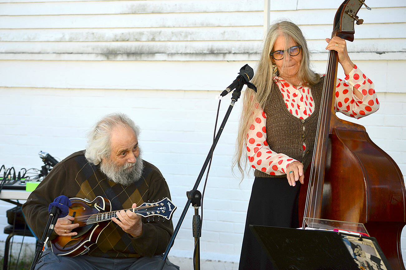 David Grisman, beside his artist and musician wife Tracy Bigelow Grisman, has contributed a private mandolin lesson to the Northwind Auction online now. Grisman, known as the "Paganini of the mandolin," includes his music books, "Dawg Grass," "Dawg Latin," "Dawg Jazz" and "Dawg Roots."  Diane Urbani de la Paz/Peninsula Daily News