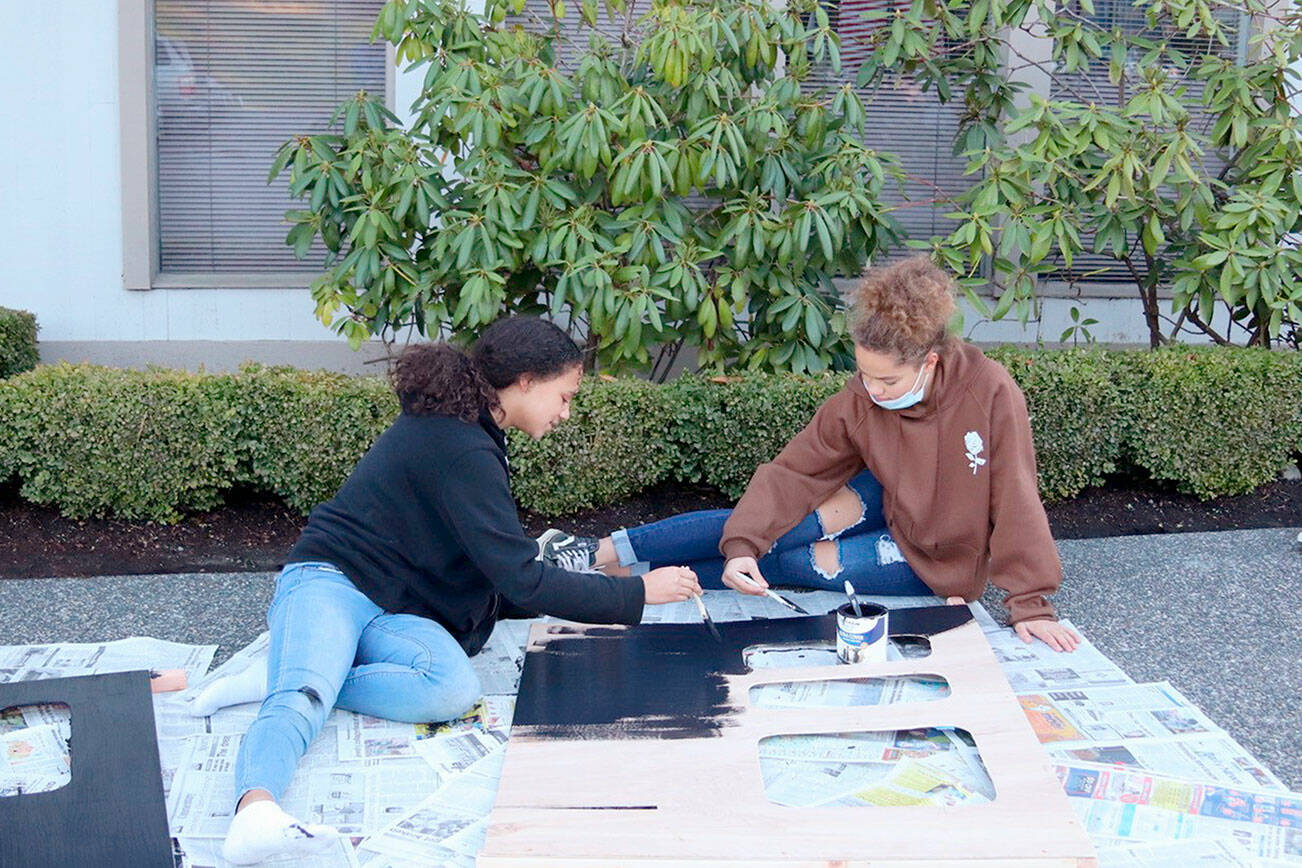 PHOTO BY: Nathan Byers/Sequim Adventist Church 

CAPTION: Teen leaders Ava Hubbard, of Port Townsend, on the left, and Briangela Vanwart, of Sequim, paint scenery in preparation for the Rocky Railroad Kids’ Night