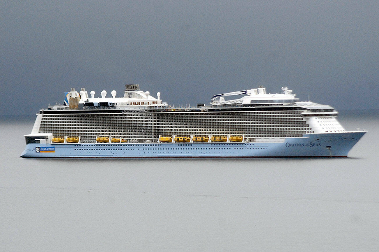 Keith Thorpe/Peninsula Daily News
The Royal Caribbean Cruises ship Ovation of the Seas sits anchored at the mouth of Port Angeles Harbor on Tuesday.