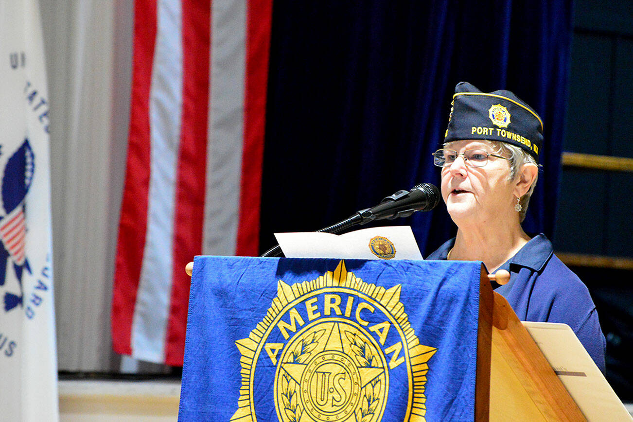 At the Veterans Day event at Port Townsend's American Legion hall Thursday, Post Commander Kathryn Bates called on attendees to remove the stigma around asking for help with post-traumatic stress and depression. Diane Urbani de la Paz/Peninsula Daily News
