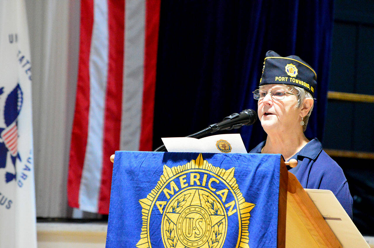 At the Veterans Day event at Port Townsend's American Legion hall Thursday, Post Commander Kathryn Bates called on attendees to remove the stigma around asking for help with post-traumatic stress and depression. (Diane Urbani de la Paz/Peninsula Daily News)