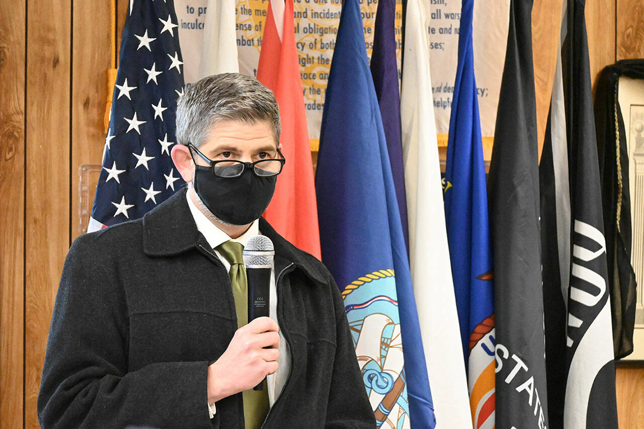 Featured speaker Mark Ozias, a Clallam County commissioner, lauds veterans for their service and ability to help restore their communities at a special Veterans Day event at American Legion Jack Grennan Post No. 26 in Sequim. (Michael Dashiell/Olympic Peninsula News Group)