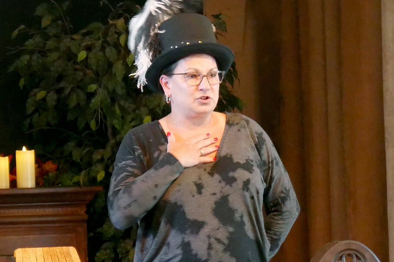 Jeanné Sparks, pictured at a recent Tale Spinners event, will cohost the Out Loud Story Slam at Sequim's Olympic Theatre Arts Center this Friday. (Photo courtesy Out Loud Story Slam)