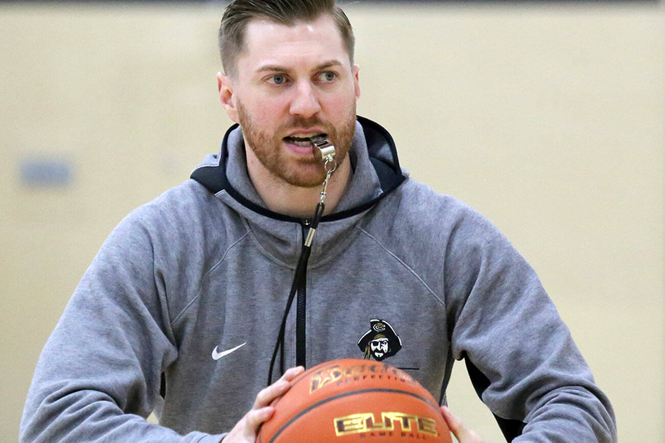 Peninsula College
Peninsula College men's basketball coach Donald Rollman conducts a drill during a recent practice. With 10 experienced players returning to a 16-player roster, the Pirates look to compete for a North Region title.