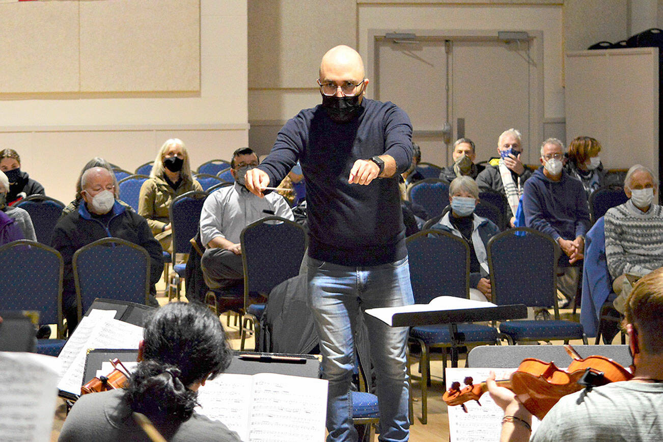 Conductor Tigran Arakelyan leads the Port Townsend Symphony Orchestra in rehearsal last month. The ensemble will give its winter concert this Saturday at the Chimacum High School auditorium. Diane Urbani de la Paz/Peninsula Daily News