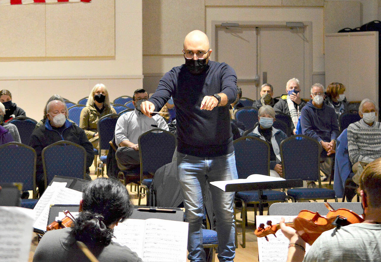 Conductor Tigran Arakelyan leads the Port Townsend Symphony Orchestra in rehearsal last month. The ensemble will give its winter concert this Saturday at the Chimacum High School auditorium. (Diane Urbani de la Paz/Peninsula Daily News )