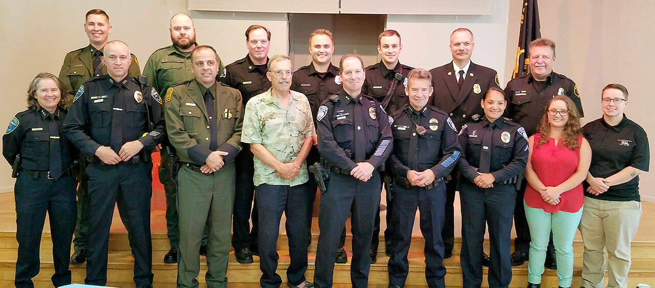 Pictured in the front row, from left to right: Chief Sheri Crain, Deputy Chief Mike Hill, Agent Daniel Janikic, Sheriff Bill Benedict, Officer Eric Walker, Chief Brian Smith, Officer Swift Sanchez, Jessica Conner Chelsea Jensen. Back row, from left to right: Agent in Charge Corey Lindsay, Agent Daniel Ervin Yarbrough, Fire Marshall Mike Sanders, Firefighter/Paramedic Tyler Gage, Firefighter/Paramedic Michael Stroobant, Chief Jake Patterson and Lieutenant Kevin Thompson.