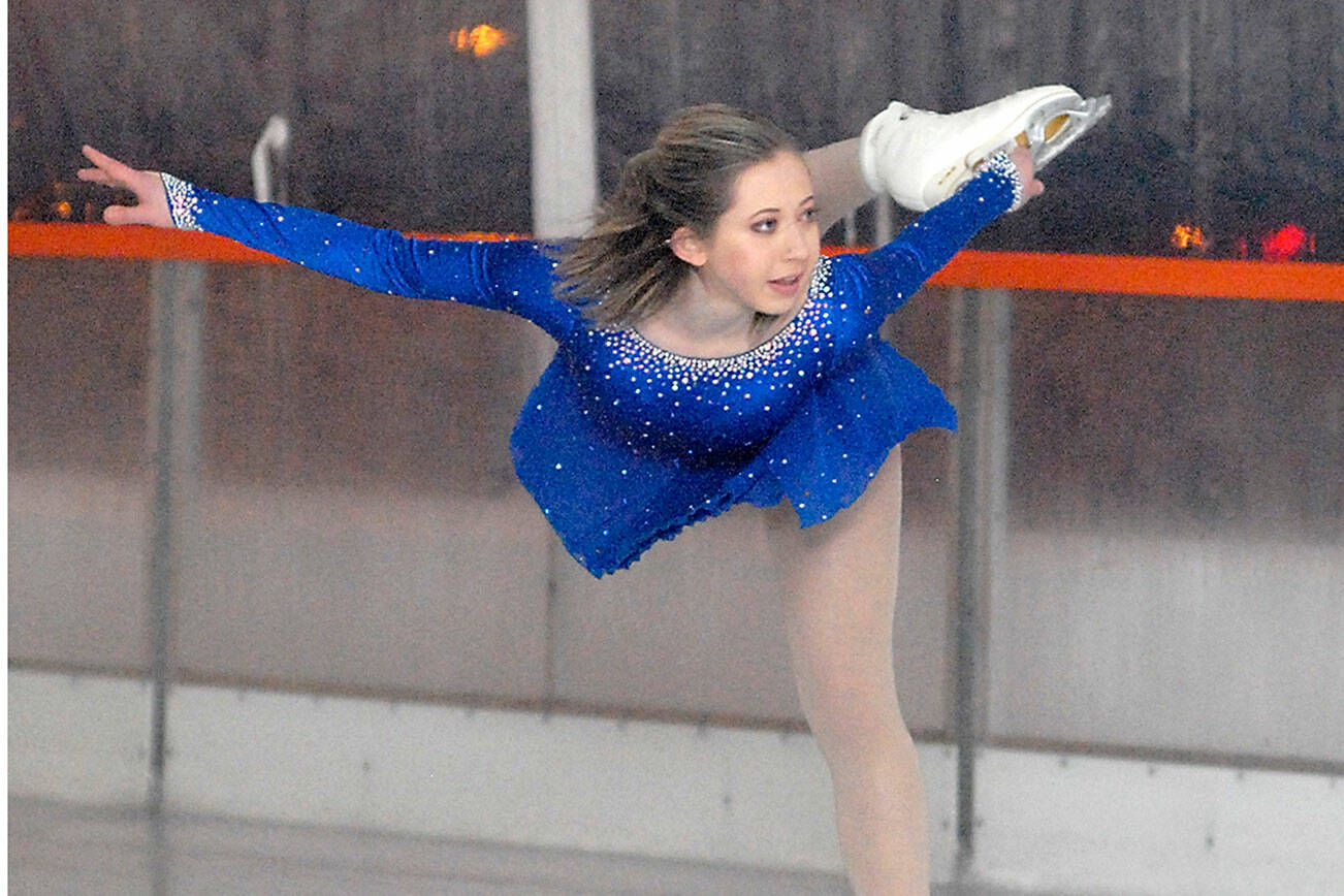 Savannah Morrey of Bremerton gives a figure skating demonstration in 2018 at the Port Angeles Winter Ice Village.