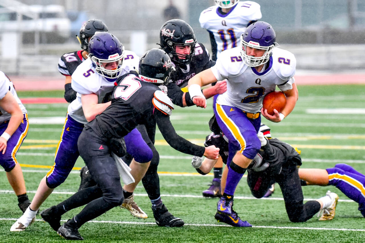 Bishop Budnek (2) runs the ball in the state 1B championship game against Almira-Coulee-Hartline. (Jim Wilkerson/for Peninsula Daily News)