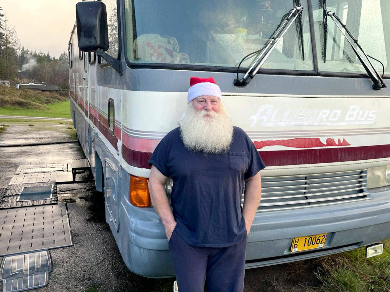 Playing Santa Claus this year is one of several ways that Barry Swegle is turning himself around eight years after a Gales Addition bulldozer incident drew international attention. (Paul Gottlieb/Peninsula Daily News)