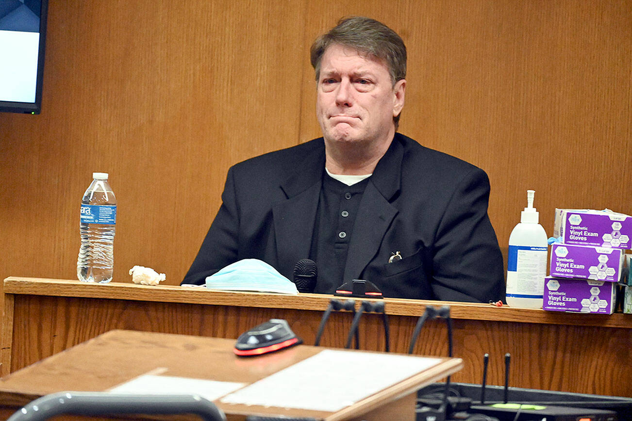 Paul Gottlieb/Peninsula Daily News
Dennis Bauer gets emotional while testifying at his triple murder trial.
