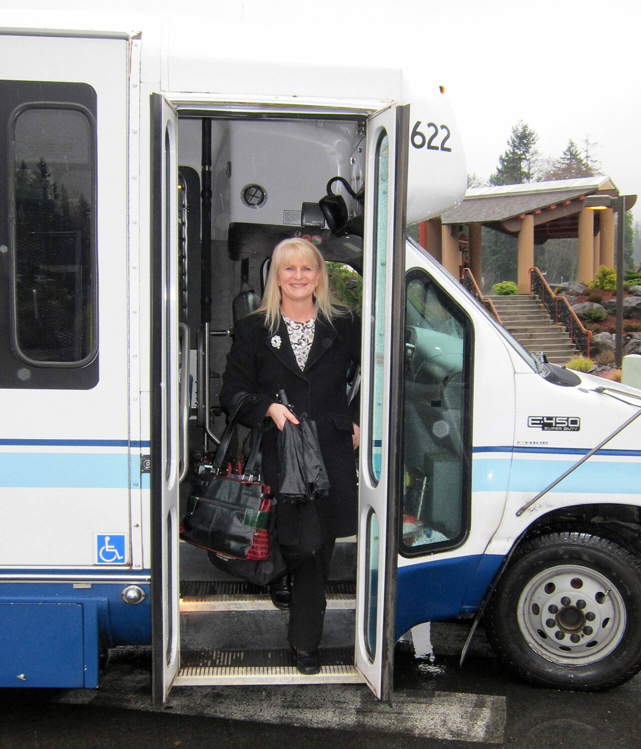 Annette Nesse disembarks a Clallam Transit bus at a stop on the Jamestown route she helped coordinate as the Jamestown S’Klallam Tribe’s transportation lead. (Photo courtesy of Jamestown S’Klallam Tribe)
